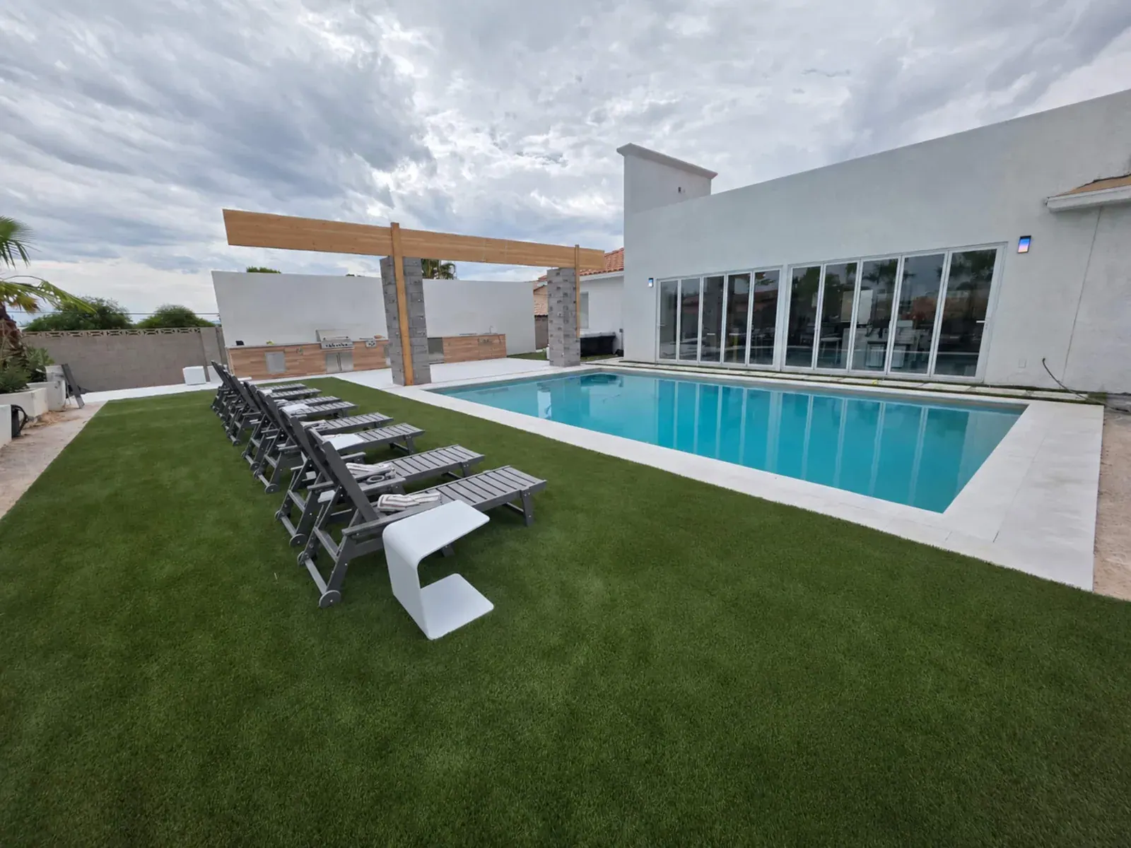 Outdoor lounging beside the heated pool